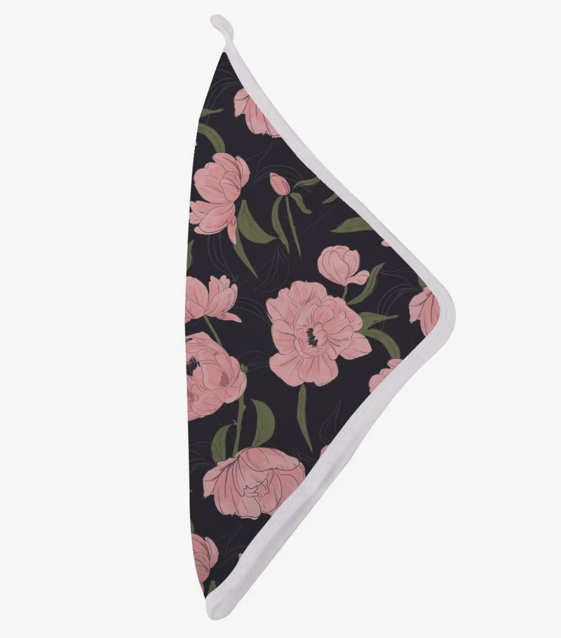 Dark black background, white trim, pink florals, cute baby washcloth for newborns